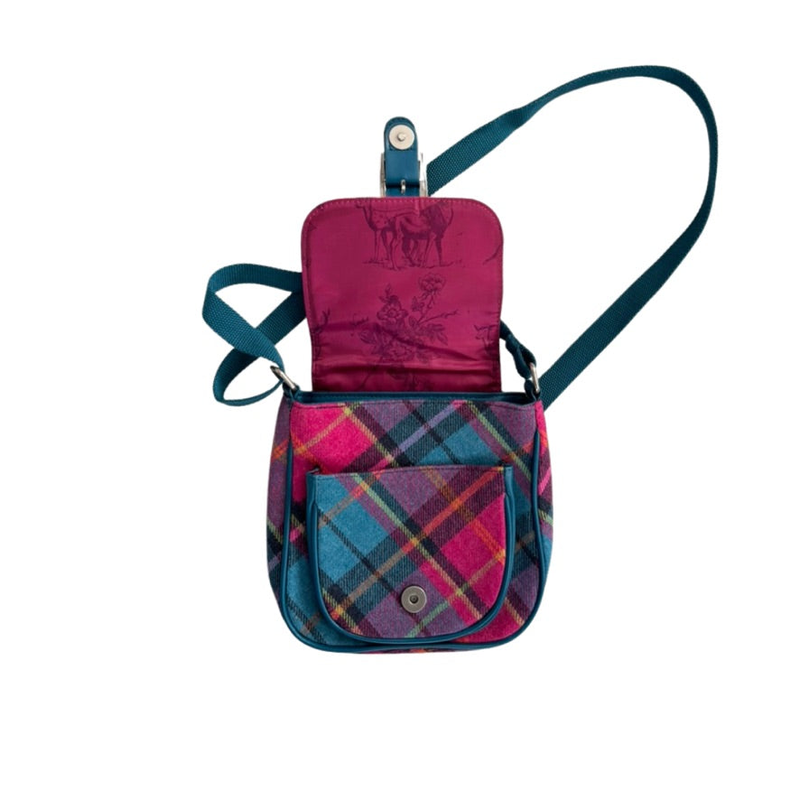 Plaid patterned crossbody bag with open front pocket on a white background