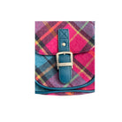 Colorful plaid bag with a blue strap and buckle on a white background