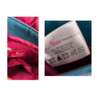 Close-up of a pink garment with 'Ness' branding and a label on a white background.