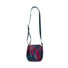 Plaid patterned shoulder bag on a white background
