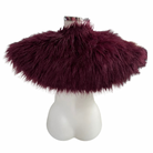 Burgundy fluffy shawl on a mannequin bust against a white background