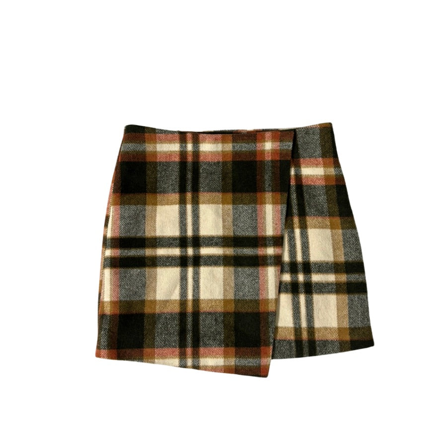 Plaid skirt with brown, beige, and black colors on a white background