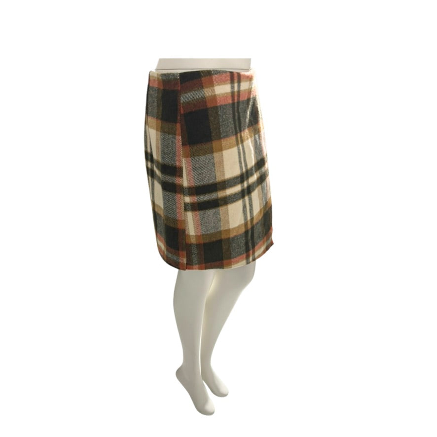 Plaid skirt on a mannequin against a white background