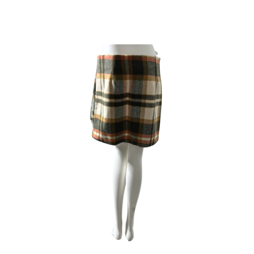 Plaid skirt on a mannequin against a white background