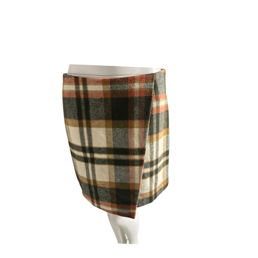 Plaid skirt on a mannequin against a white background