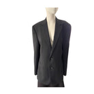 Black suit jacket on a mannequin against a white background