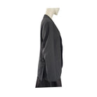 Black blazer on a mannequin against a white background