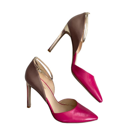 Pair of pink and brown high-heeled shoes on a white background