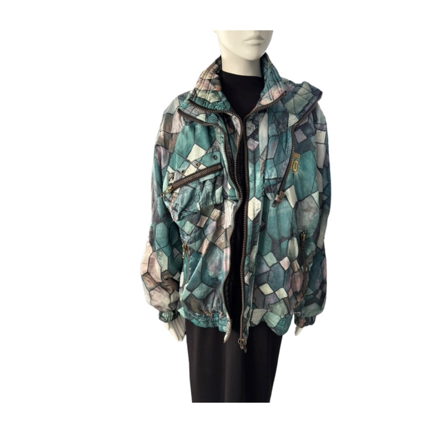 Multicolored patterned jacket on a mannequin against a white background