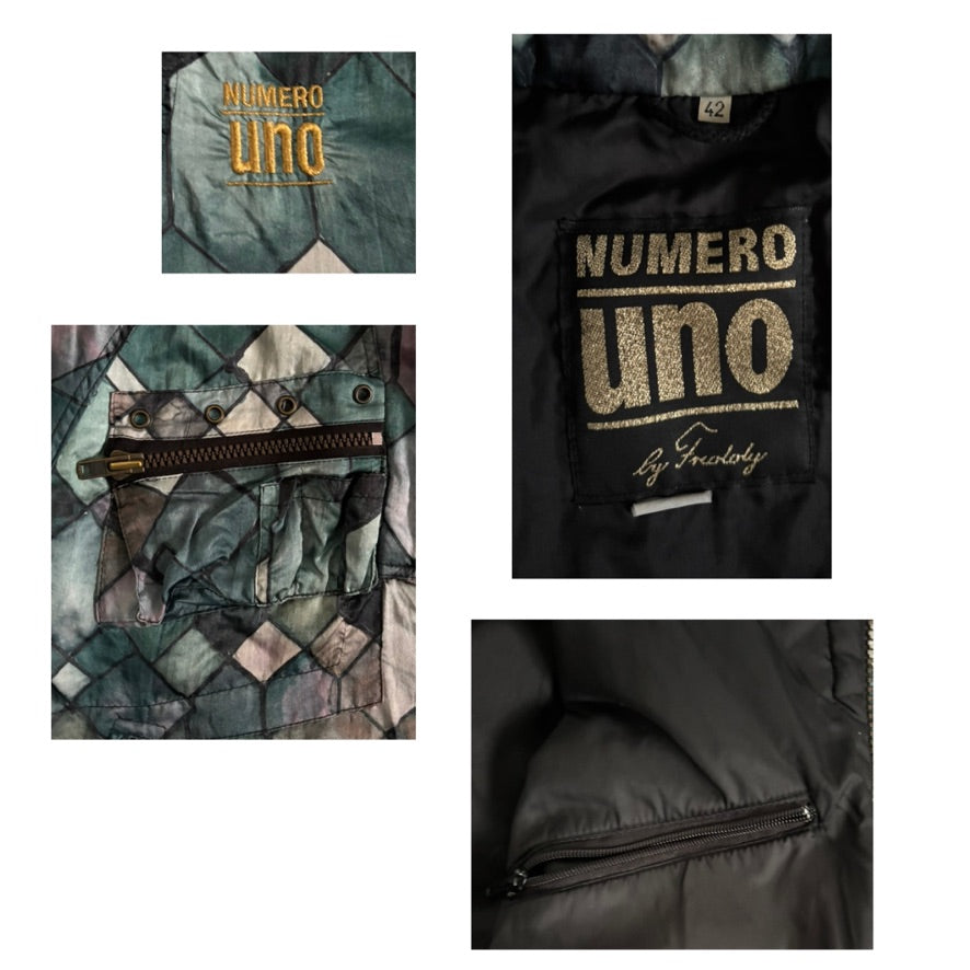 Jacket with 'Numeráolo Uno' branding and geometric pattern on a white background