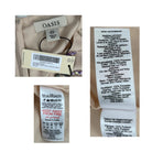 Collection of clothing labels with brand name 'Oasis' and text details.