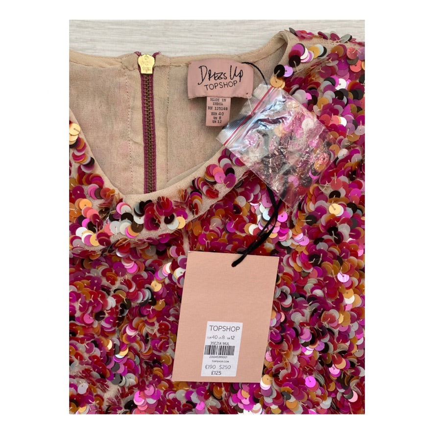 Topshop sequin dress with a visible tag on a white background