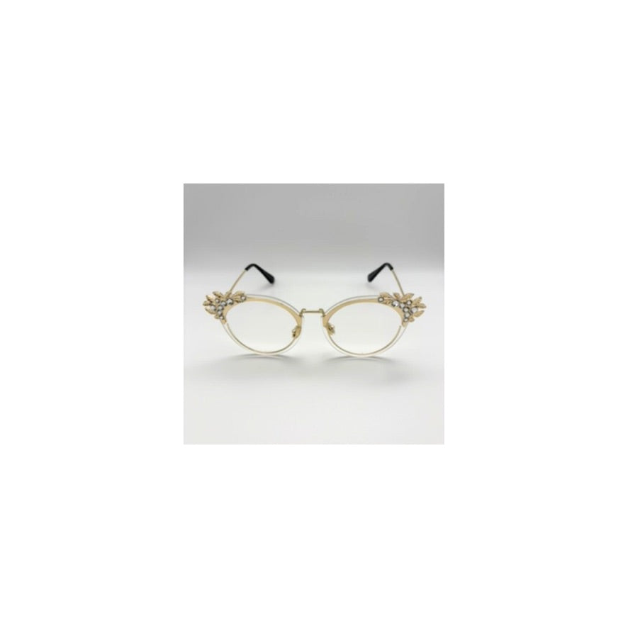 Gold-framed eyeglasses on a white background