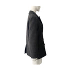 Grey checkered blazer on a mannequin against a white background