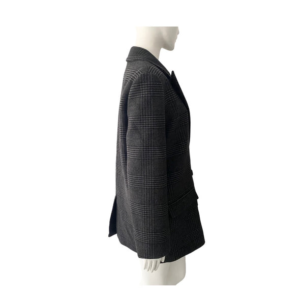 Grey checkered blazer on a mannequin against a white background