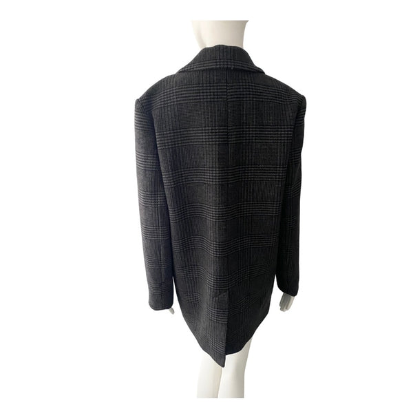 Black checkered blazer on a mannequin against a white background