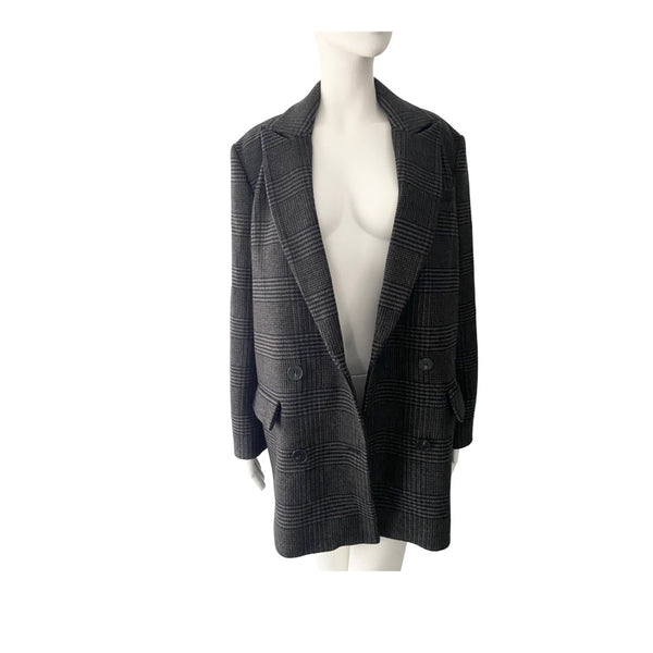 Grey checkered blazer on a mannequin against a white background