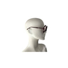 Sunglasses on a mannequin head against a white background