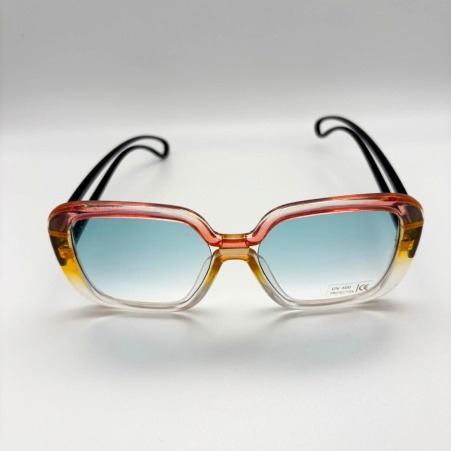 Multicolored sunglasses with a gradient effect on a light gray background