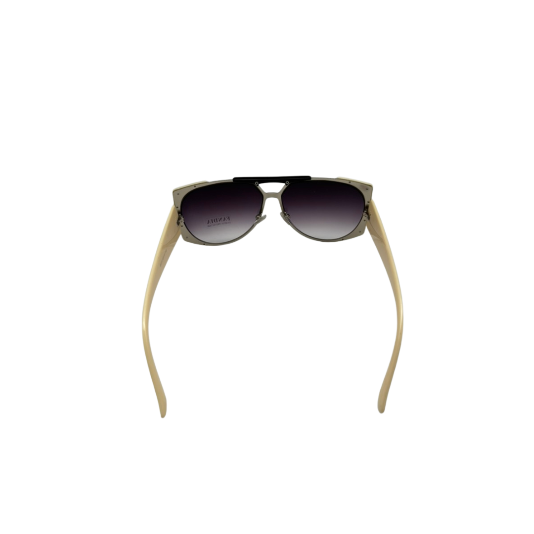 Sunglasses with beige frame and dark lenses on a white background
