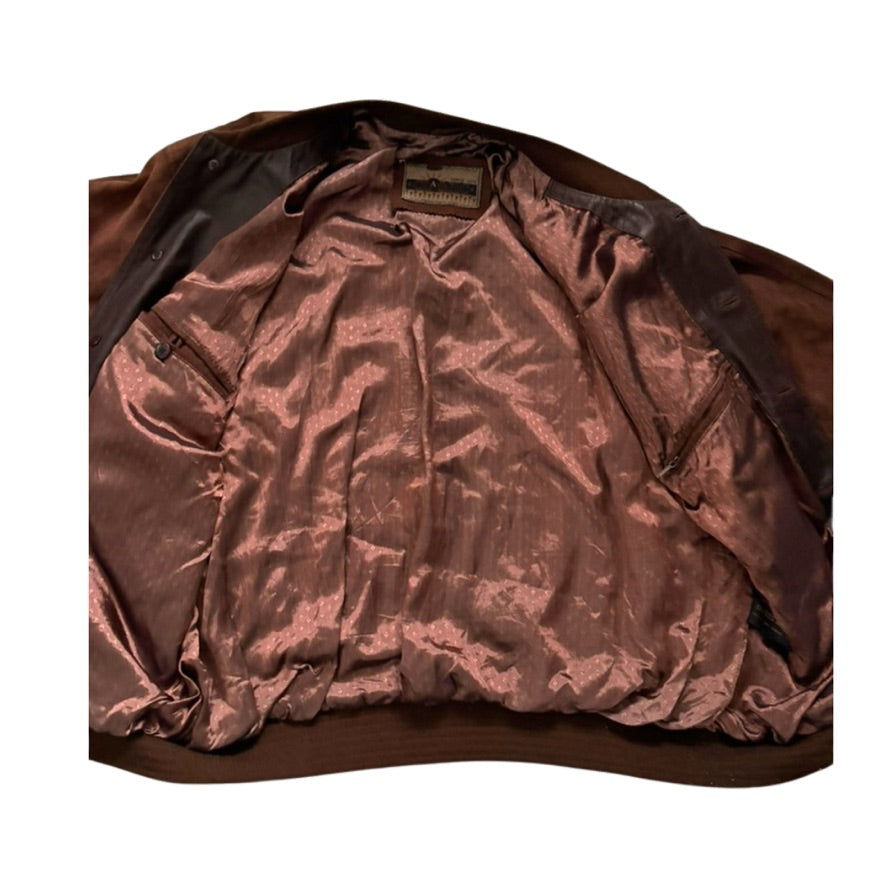 Brown leather jacket with visible stitching on a white background