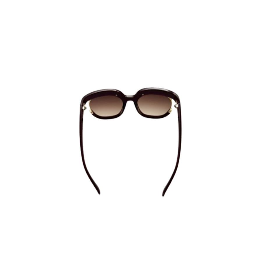 Sunglasses with brown gradient lenses on a white background