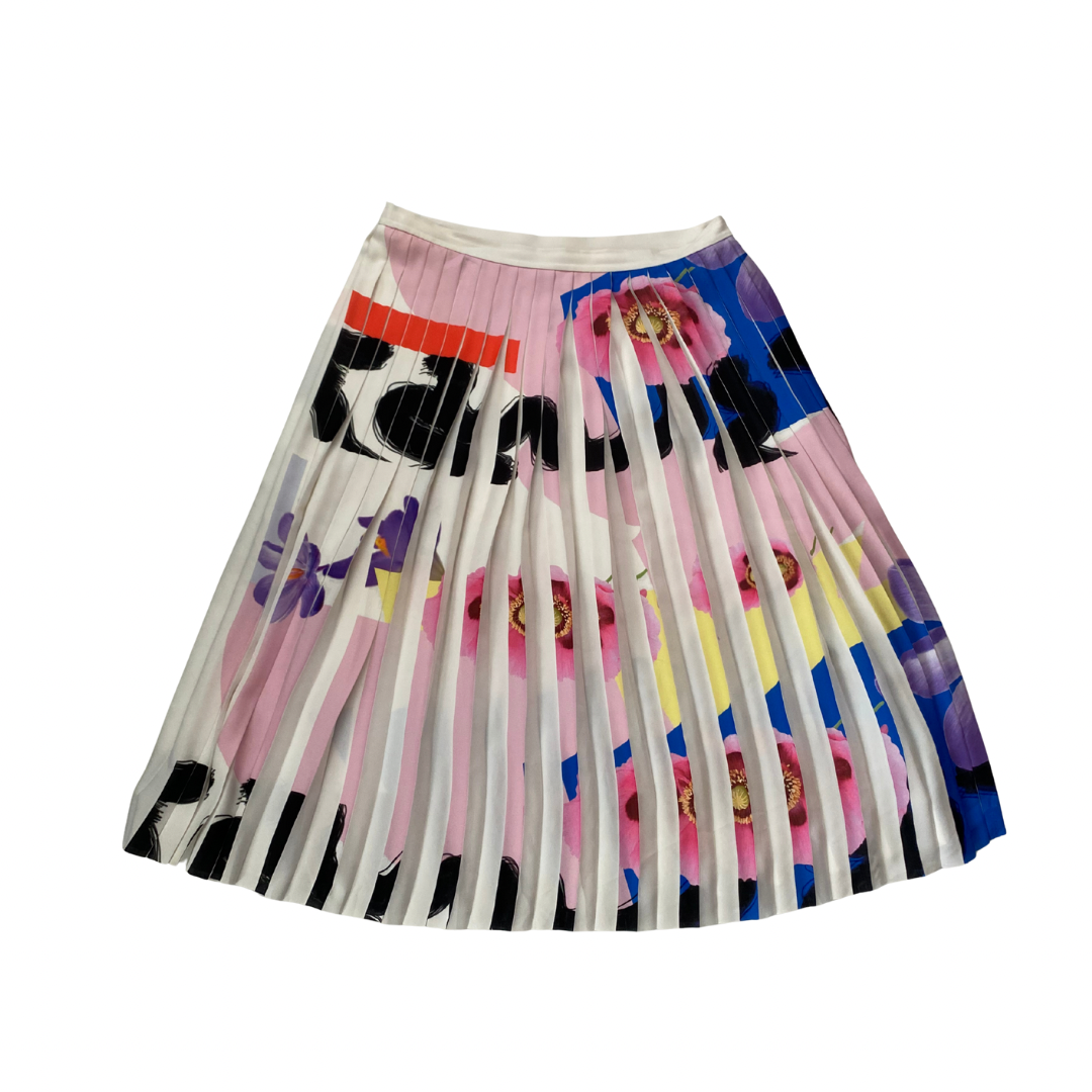 Colorful pleated skirt with abstract design on a white background