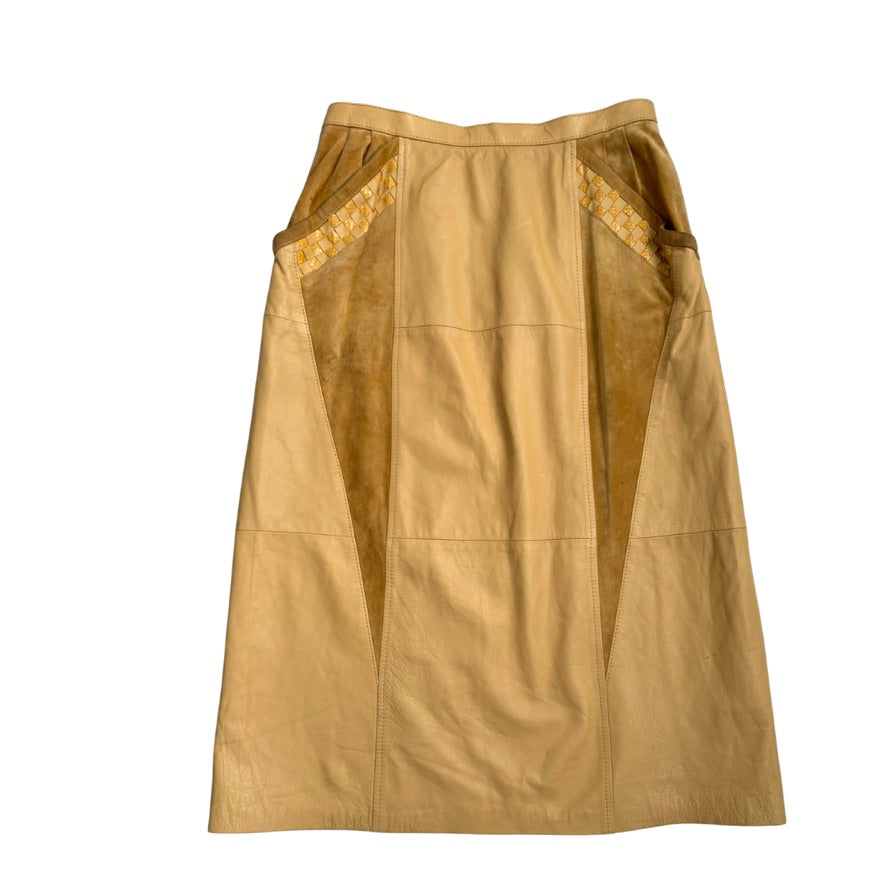 Yellow leather pencil skirt on white background