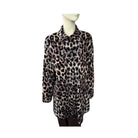 Leopard print shirt on a mannequin against a white background