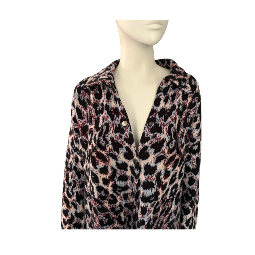 Mannequin wearing a leopard print cardigan on a white background