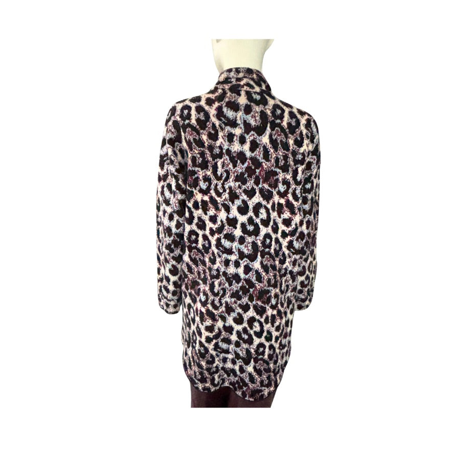 Leopard print dress on a mannequin against a white background