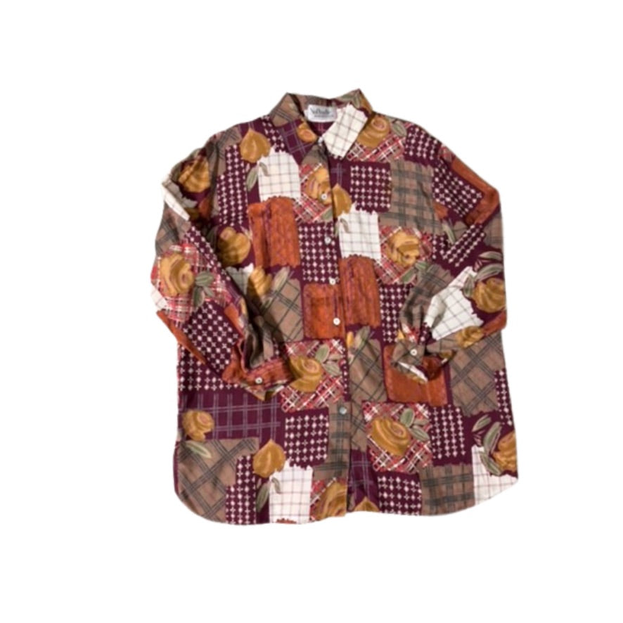 Patchwork shirt with autumnal patterns on a white background