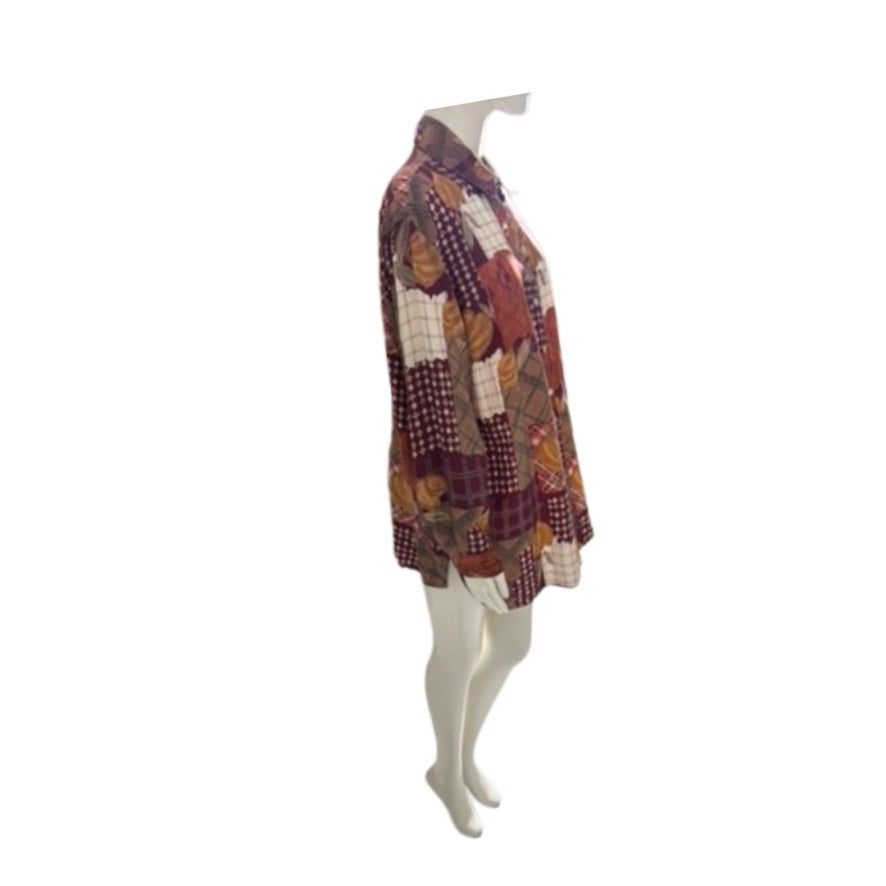 Multicolored patchwork shirt on a white mannequin against a white background