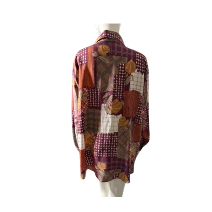 Patchwork shirt on a mannequin against a white background