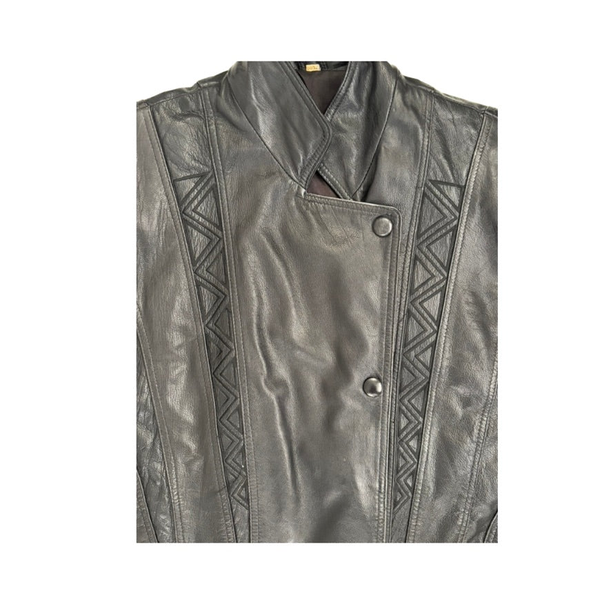 Charcoal leather vest with geometric patterns on a white background