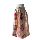 Floral patterned skirt on a mannequin against a white background