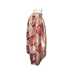 Floral patterned skirt on a mannequin against a white background