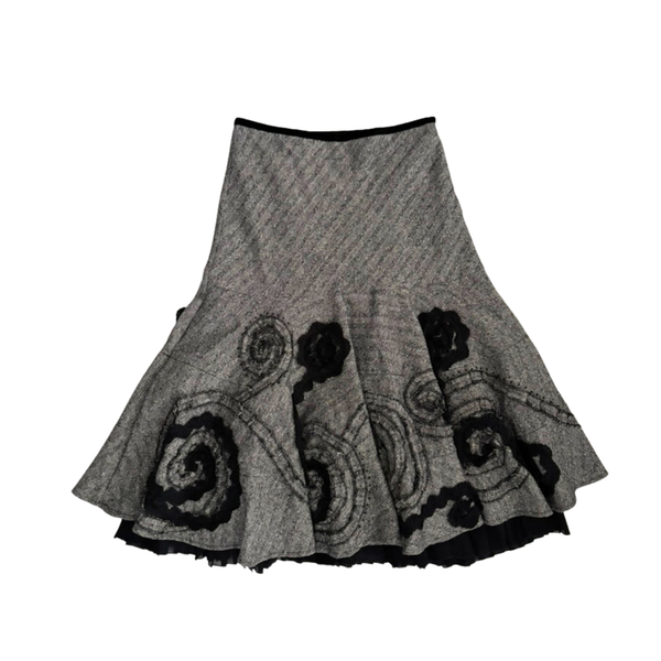 Gray skirt with black floral patterns on a white background