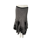 Gray skirt with decorative elements on a white background