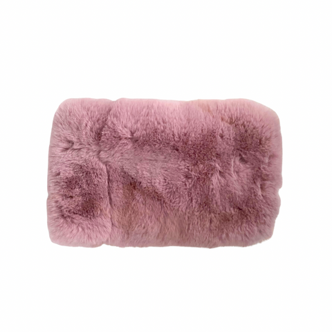 Pink fluffy neck stole on a white background