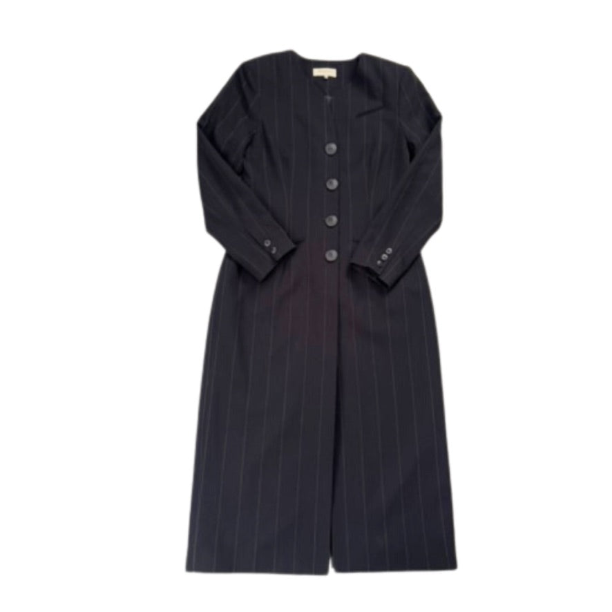 Black  pinstripe dress with button details on a white background
