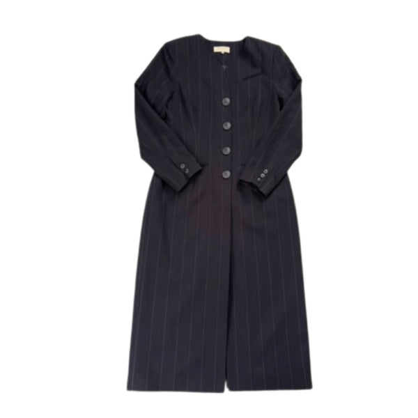 Black  pinstripe dress with button details on a white background