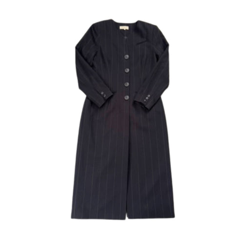 Black  pinstripe dress with button details on a white background