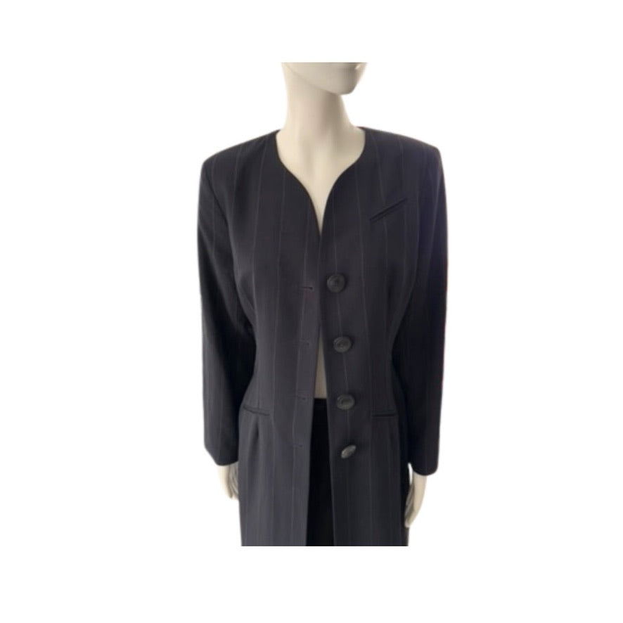 Black suit jacket with buttons on a mannequin against a white background