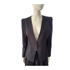 Dark gray blazer on a mannequin against a white background