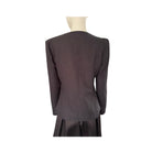 Dark gray suit jacket on a mannequin against a white background