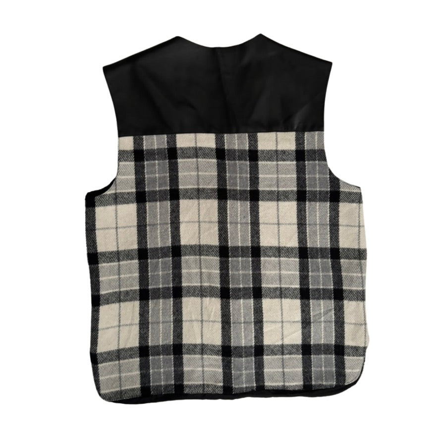 Plaid patterned vest on a white background