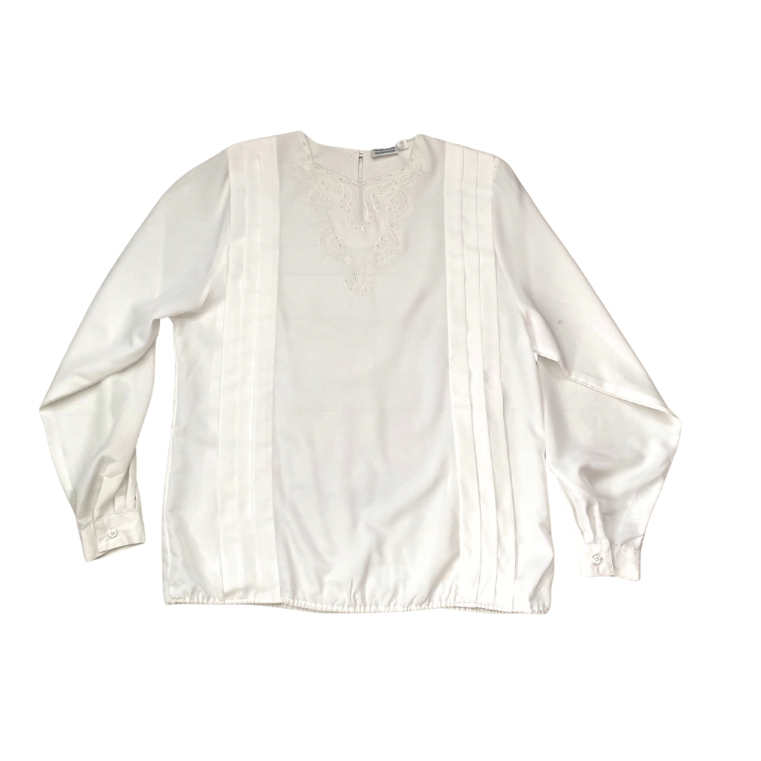 White blouse with long sleeves on a white background