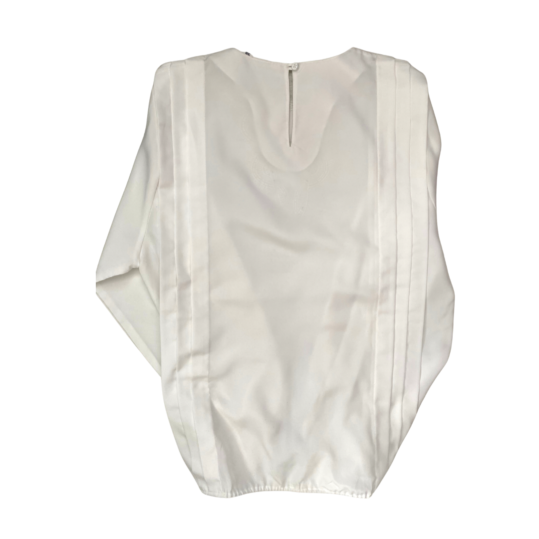 White sleeveless top on a white background