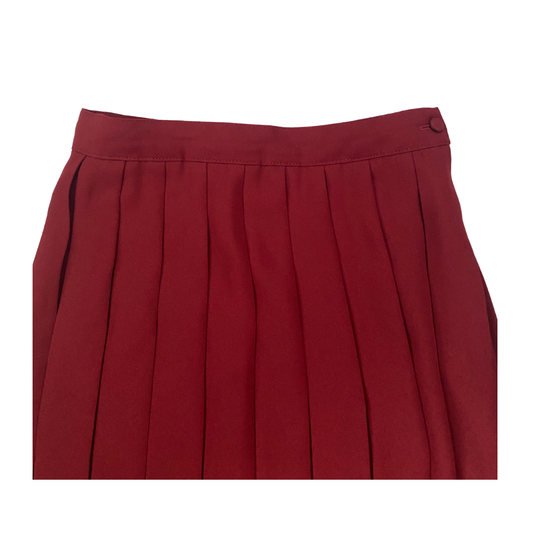 Red pleated skirt on a white background